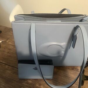 New without tags. Used a couple of times but its to big: